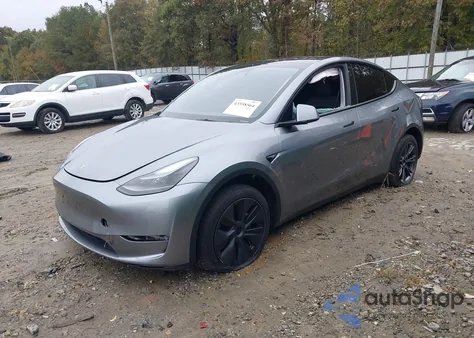 2025 Tesla Model Y Long Range Dual Motor Rear-Wheel Drive z USA, uszkodzony, nr VIN 7SAYGDED9SA358462